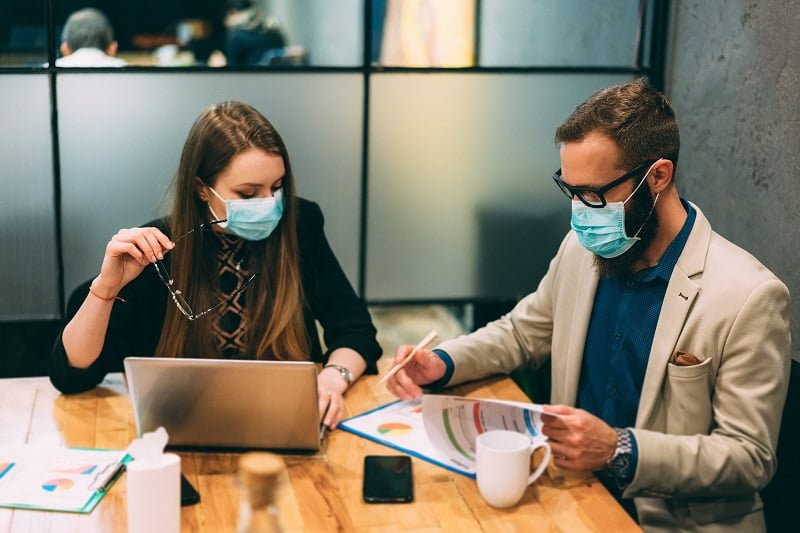 Businesspeople At Work During Covid 19 Pandemic